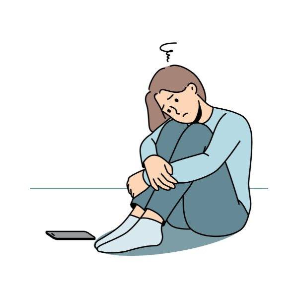 利用前：床に座って膝を抱えた女性